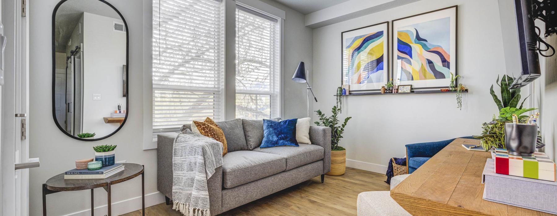 a living room with a couch and a table