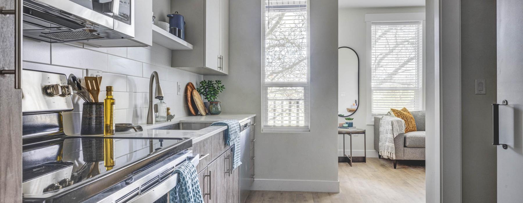 a kitchen with a stove and oven