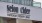 a sign on the side of a building