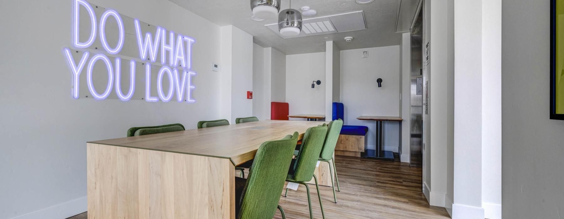 a room with a table and chairs