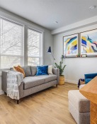 a living room with a couch and a table